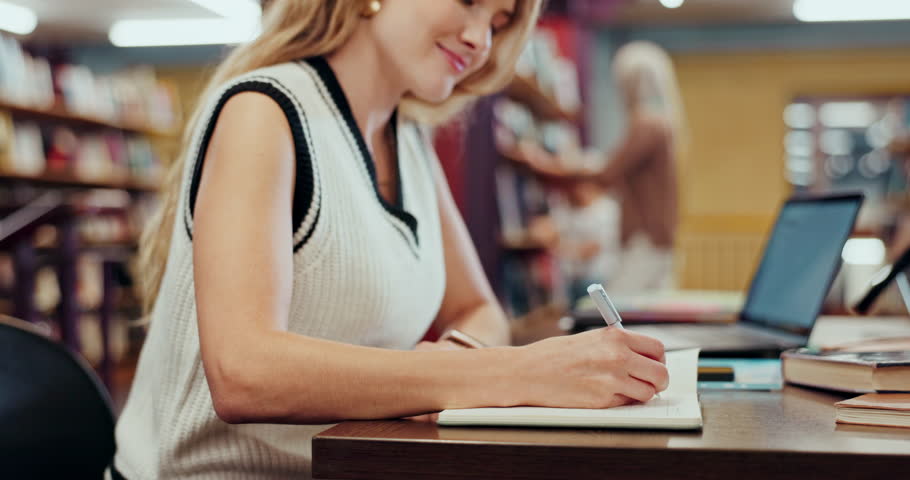 Student, girl and writing with laptop in library for assessment research, task project and notes for religious study. Female learner, digital technology and thoughts for ideas on college assignment.