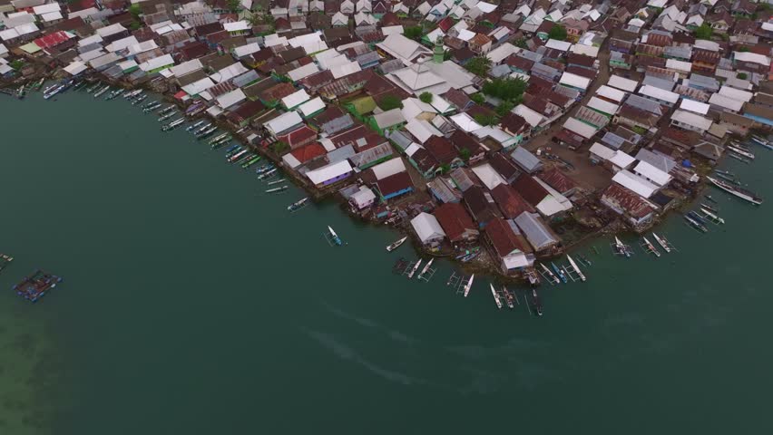 Aerial view of fishing village at sunrise on Bungin Island, Sumbawa, Indonesia.