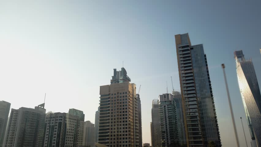 Dubai, United Arab Emirates, Middles East - December, 28, 2023 - The view from a train traveling on the Dubai Metro