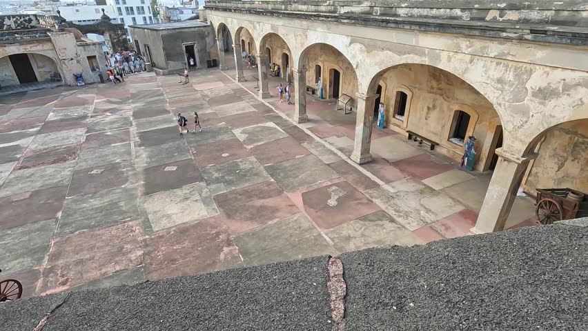 walking in the courtyard of castille san cristobal in san juan puerto rico (historic site on caribbean island) travel tourism destination national park sightseeing spanish ruins old city center tour