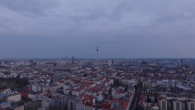 Aerial view of Berlin's cityscape at dusk, capturing landmarks and architectural beauty from above against a serene twilight sky - Powered by Shutterstock - Get 15% off with code: PIKWIZARD15