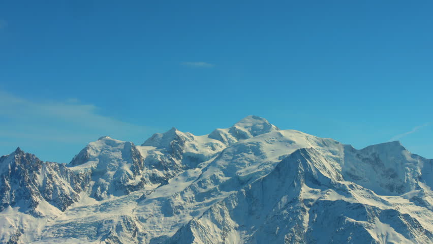 The summit of Mont Blanc and the adjacent mountains are the highest in the Alpine massif.