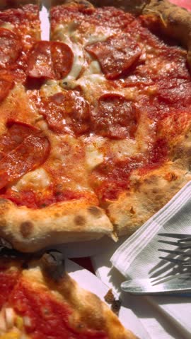 Aerial view of a mouthwatering, aromatic Italian pizza.