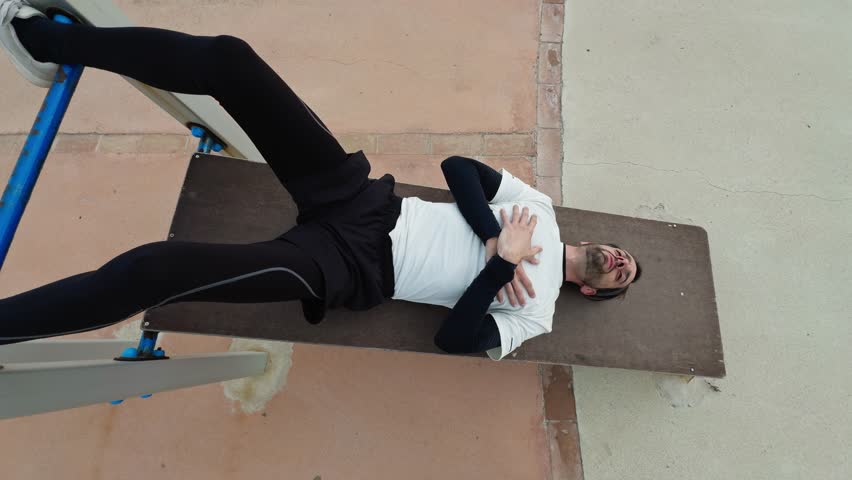 A Man Doing Abdominals Training Seen From Above