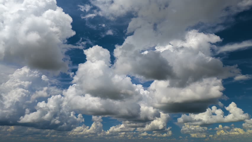 Blue sky with white clouds. Bright summer skyscape