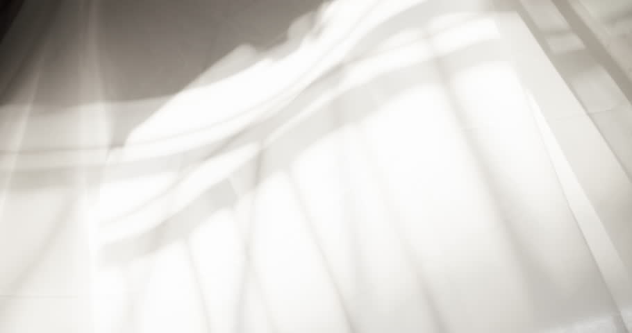 Translucent curtains on the windows while gently being blown by the wind., Slow motion
