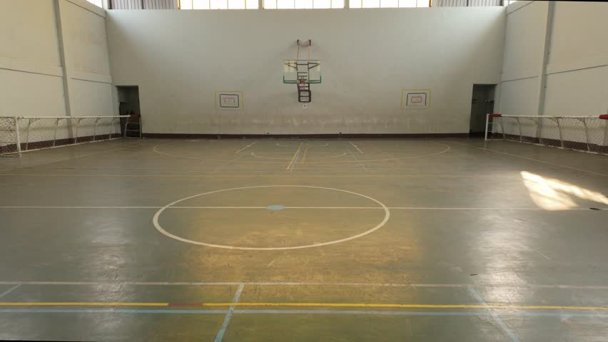 Abandoned Sports Facility: Empty Basketball Court