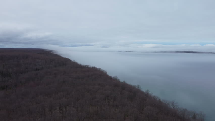 
Aerial view Miners Castle Pictured Rocks National Lake shore foggy drone shot
