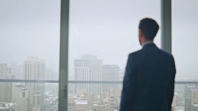 Thoughtful boss resting office contemplating gloomy city back view. Successful serious man thinking company development corporate career in panoramic cabinet closeup. Calm businessman taking break - Powered by Shutterstock - Get 15% off with code: PIKWIZARD15