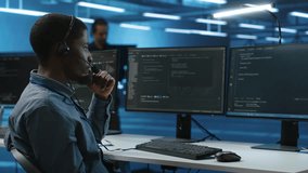 IT support worker remotely collaborating with experts to fix servers providing computing resources for workloads. Man using headphones mic to talk with manager supervising data center supercomputers - Powered by Shutterstock - Get 15% off with code: PIKWIZARD15