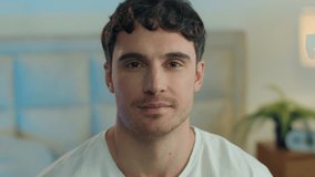 Close up happy Caucasian young man looking at camera toothy dental smile joy fun home bedroom male guy enjoy face expression facial emotion portrait smiling laugh positive relaxation cheerful gesture - Powered by Shutterstock - Get 15% off with code: PIKWIZARD15