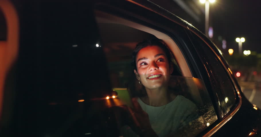 Woman, car window and smile on road with smartphone for social media, texting and networking in New York. Female passenger, taxi and happy at night with chat for online communication and traveling