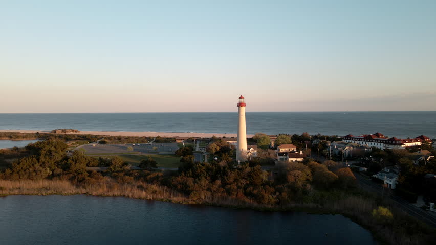Aerial View of Cape May Lighthouse Intersecting the Sun at Sunset