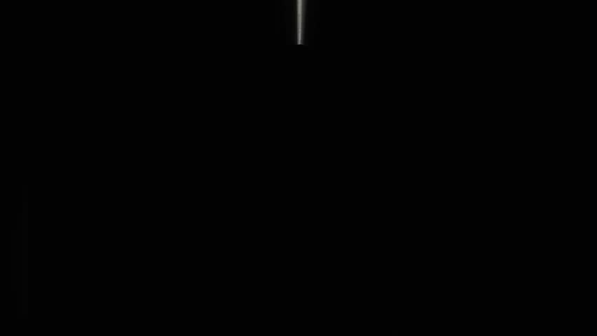 Woman opening curtains in the room at morning.