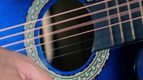 Close up of Guitar Strumming - Powered by Shutterstock - Get 15% off with code: PIKWIZARD15