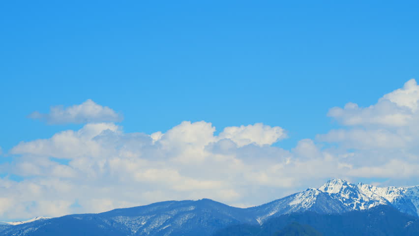 Beautiful Snow Capped Mountains. Shadow Of Cloud In Snow Mountain. Picturesque Day. Timelapse.