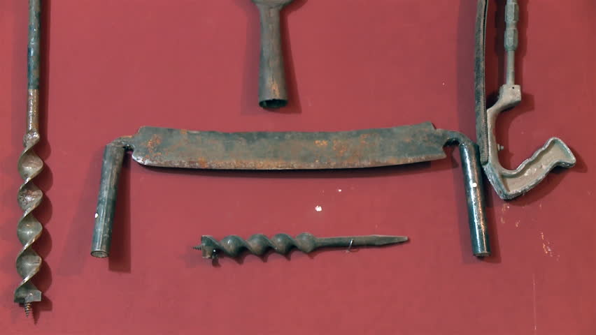 Old Metal Tools Hanging on the Wall of a Farm in La Pampa Province, Argentina. Close Up.