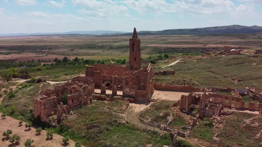 Ruins of Old Belchite Town in Zaragoza, Spain under a bright blue sky