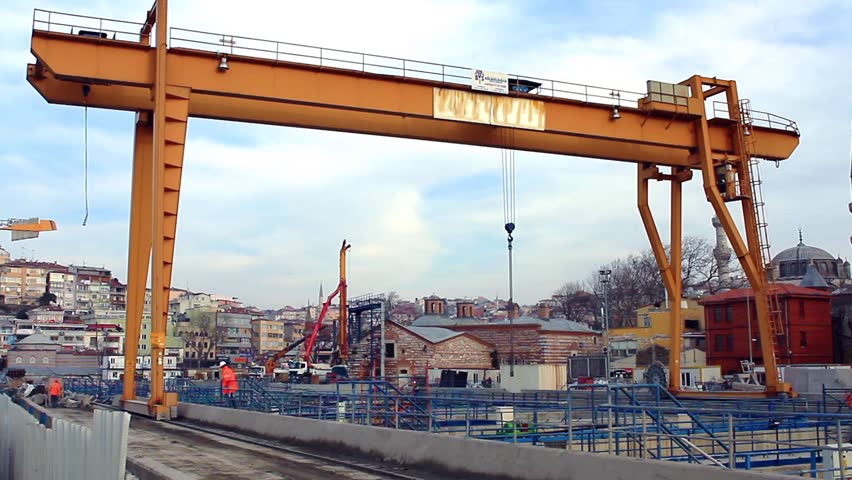 Crane moving. Double beam girder gantry crane in construction site. 

