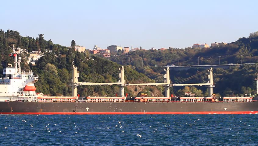 Large  bulk carrier ship with deck cranes sailing in Istanbul. A 190 mt long, 30