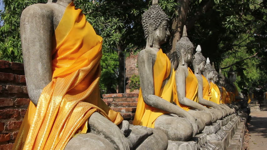 Sitting Buddha statues at a temple in Thailand