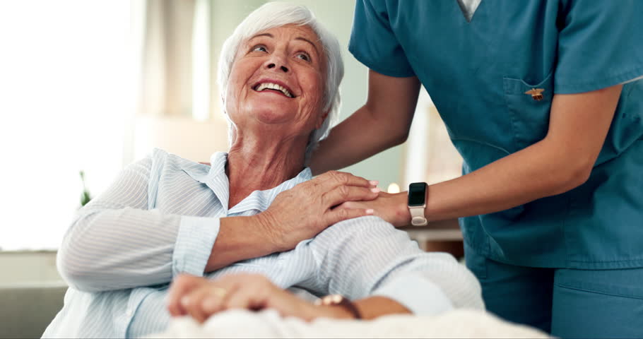 Senior woman, nurse and hands for care, comfort and .massage with body wellness and healthcare on sofa. Medical worker with retirement patient in nursing home for support, helping and happy services