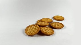 slow motion shot of falling salty crackers, salty biscuits in slow-motion - Powered by Shutterstock - Get 15% off with code: PIKWIZARD15