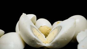 A male hand picks up boiled chicken eggs from the table as the camera glides through them. Dolly slider, close-up. - Powered by Shutterstock - Get 15% off with code: PIKWIZARD15