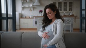 Healthy happy pregnant woman calm dreaming pensive thinking relaxing girl female future mother at home couch pregnancy dream rest relax at apartment sofa health medicine insurance anticipation baby - Powered by Shutterstock - Get 15% off with code: PIKWIZARD15