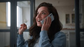 Emotional happy smiling laughing woman talking phone at home mobile call excited girl female lady talk smartphone discuss news good mood friend conversation at couch sofa laugh joke joy communication - Powered by Shutterstock - Get 15% off with code: PIKWIZARD15