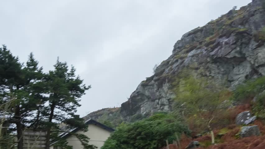 view from the moving carriage of a vintage steam train