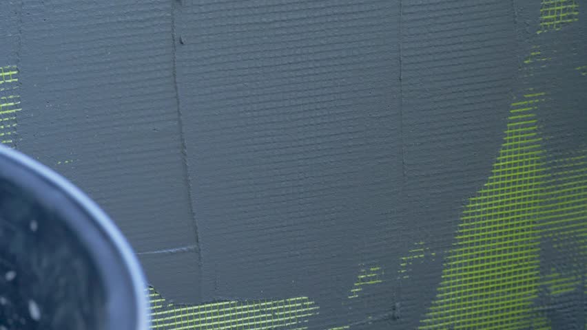 Mesh for outdoor work. Reinforcing plaster, built-in, facade. Building family house. System EWIS. Thermally insulated, protective exterior cladding procedure use polystyrene, topped off plaster