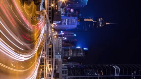 Vertical video - Night traffic in Hong Kong island business district. Time lapse - Powered by Shutterstock - Get 15% off with code: PIKWIZARD15