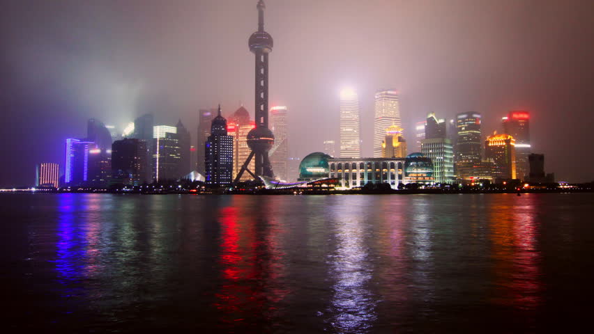 Time lapse of Shanghai skyline in drizzle night - Shanghai, China.