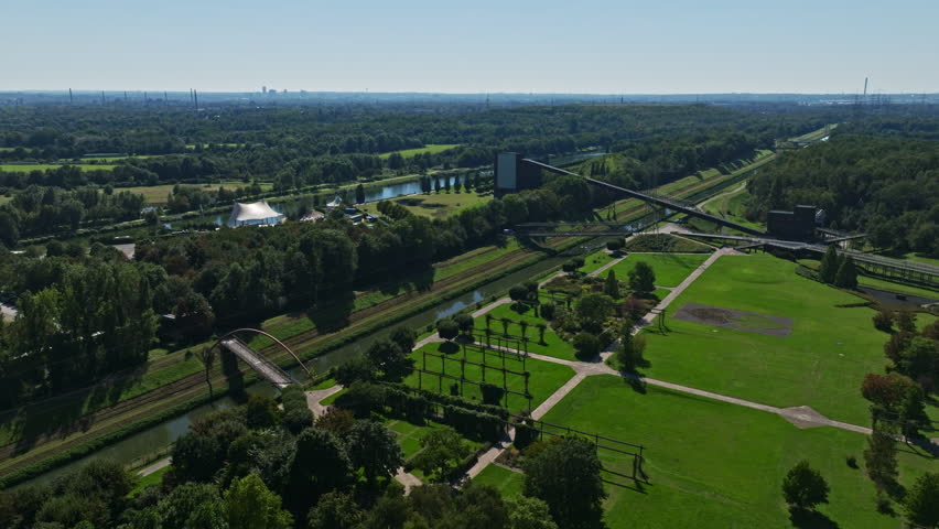 Aerial drone view of the Rhein-Herne Canal in Gelsenkirchen, Germany. The Rhine Herne kanal is a transportation canal in the Ruhr area of North Rhine-Westphalia, Germany, featuring five canal locks.