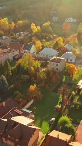 Aerial view of the Stary Sacz town in autumn at sunset, Lesser Poland Voivodeship, Poland. Parish Church of St. Elizabeth of Hungary and cityscape of Stary Sacz. Fall season in Poland