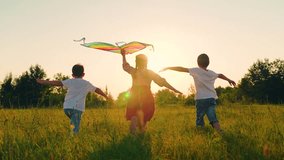 Children toy plane. Kite flies in hands of child in summer in park under sun. Children Boy, girl play with toy kite. Child's dream of flying concept, child runs across field at sunset with kite, sky - Powered by Shutterstock - Get 15% off with code: PIKWIZARD15