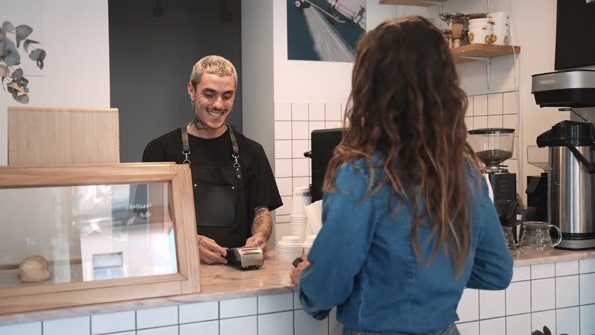 Joy woman buy take away coffee use nfc cashless payment. Contactless money transaction. Girl pay food order credit card. Bank terminal bill. Man sell hot tea drink cup cozy cafe. Happy young adult guy