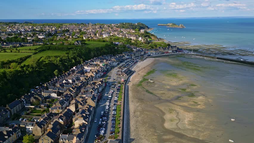 Cancale coast and beach during low tide, Brittany in France. Aerial drone sideways