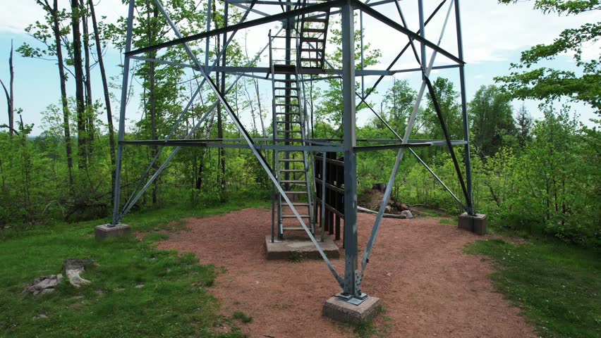 The Mountain Fire Lookout Tower, located in Mountain, Wisconsin was erected by the Mountain CCC and completed in 1935. This tower stood guard over the Nicolet National Forest.