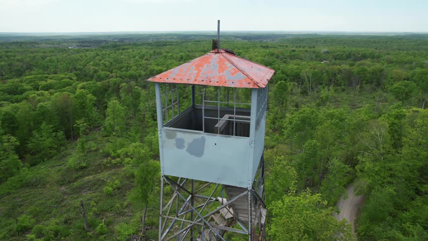 The Mountain Fire Lookout Tower, located in Mountain, Wisconsin was erected by the Mountain CCC and completed in 1935. This tower stood guard over the Nicolet National Forest.
