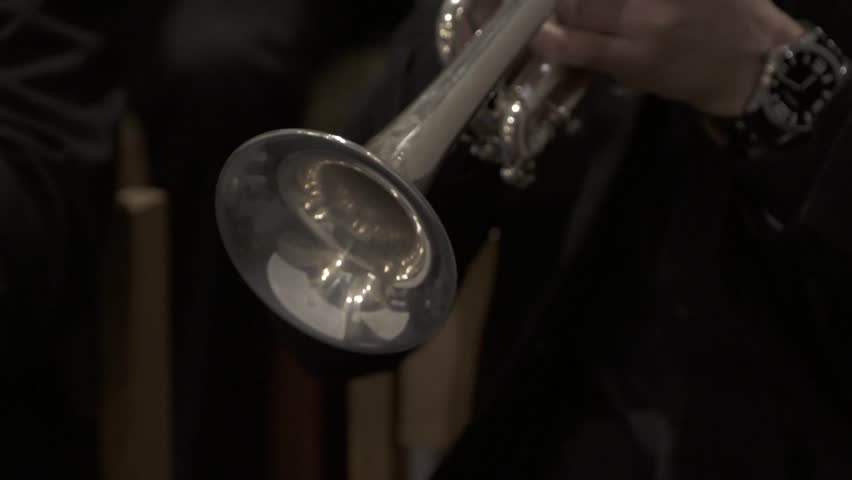 Playing trumpet close up