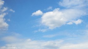 Slow moving white cumulus clouds. Blue sky with several layers of clouds. - Powered by Shutterstock - Get 15% off with code: PIKWIZARD15