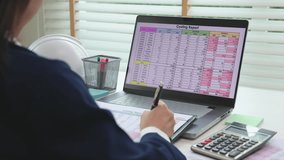 Expert woman asian female people review data number costing managerial account prepare monthly actual cost variance report at tax audit office. ESG sheet budget control ERP process service project. - Powered by Shutterstock - Get 15% off with code: PIKWIZARD15