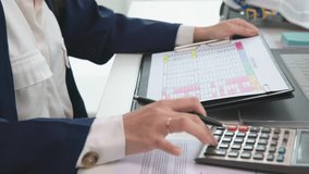 Expert woman asian female people review data number costing managerial account prepare monthly actual cost variance report at tax audit office. ESG sheet budget control ERP process service project. - Powered by Shutterstock - Get 15% off with code: PIKWIZARD15