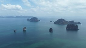 Beautiful tropical islands of Thailand, high altitude view of the islands in the middle of the sea, 4k drone video