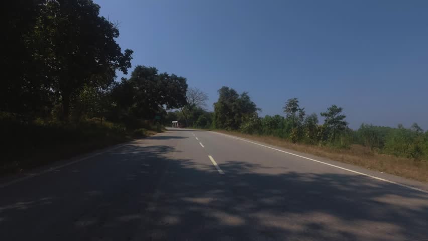 View of a Bus Stop and a Brick Factory and the Agriculture Harvesting Place on the Highway Road 1080