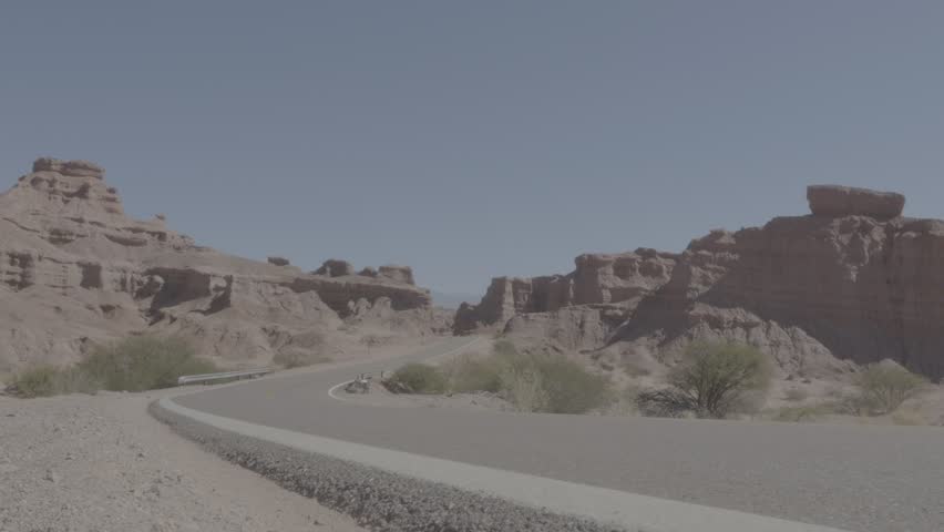 V-Log video footage of a road with a vehicle in the Quebrada de las Conchas in the province of Salta, north-west Argentina