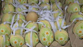 Painted Easter eggs decorated with yellow and green patterns with small floral motifs capture the essence of the spring season. Vienna Easter Fair
 - Powered by Shutterstock - Get 15% off with code: PIKWIZARD15
