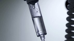 iv drip drops into the patient's room Closeup Saline solution or NSS fluid from IV bag NSS iv dripping tube infusion pumping in hospital chemotherapy - Powered by Shutterstock - Get 15% off with code: PIKWIZARD15